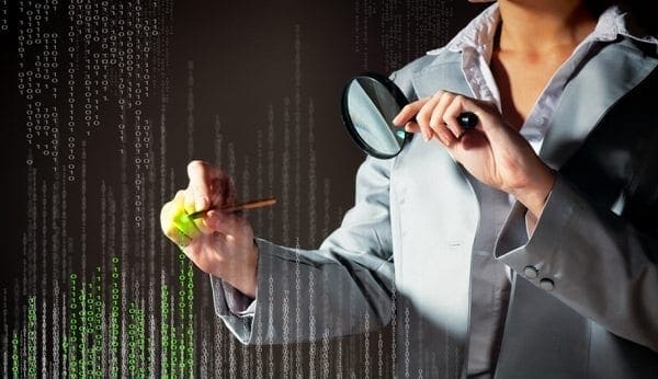 A suited professional examines digital code with a magnifying glass and highlighter, illustrating evidence-based cyber risk review.