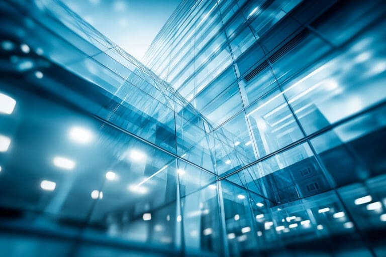 A low angle view of a building, illustrating sound Cyber Risk Advisory and independent Third-Party Cyber Risk Validation in business.