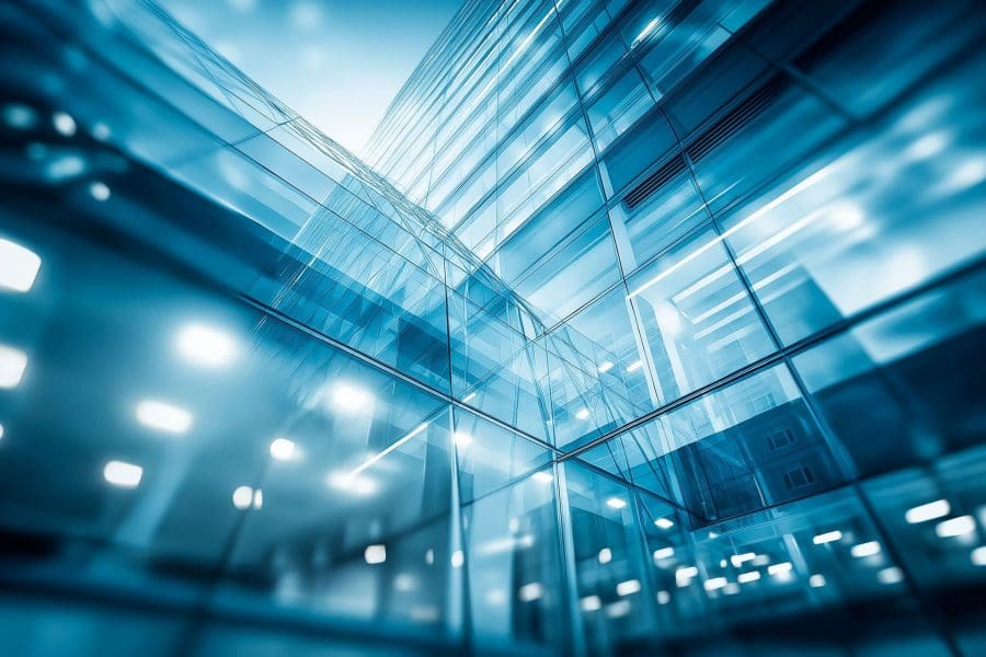 A low angle view of a building, illustrating sound Cyber Risk Advisory and independent Third-Party Cyber Risk Validation in business.